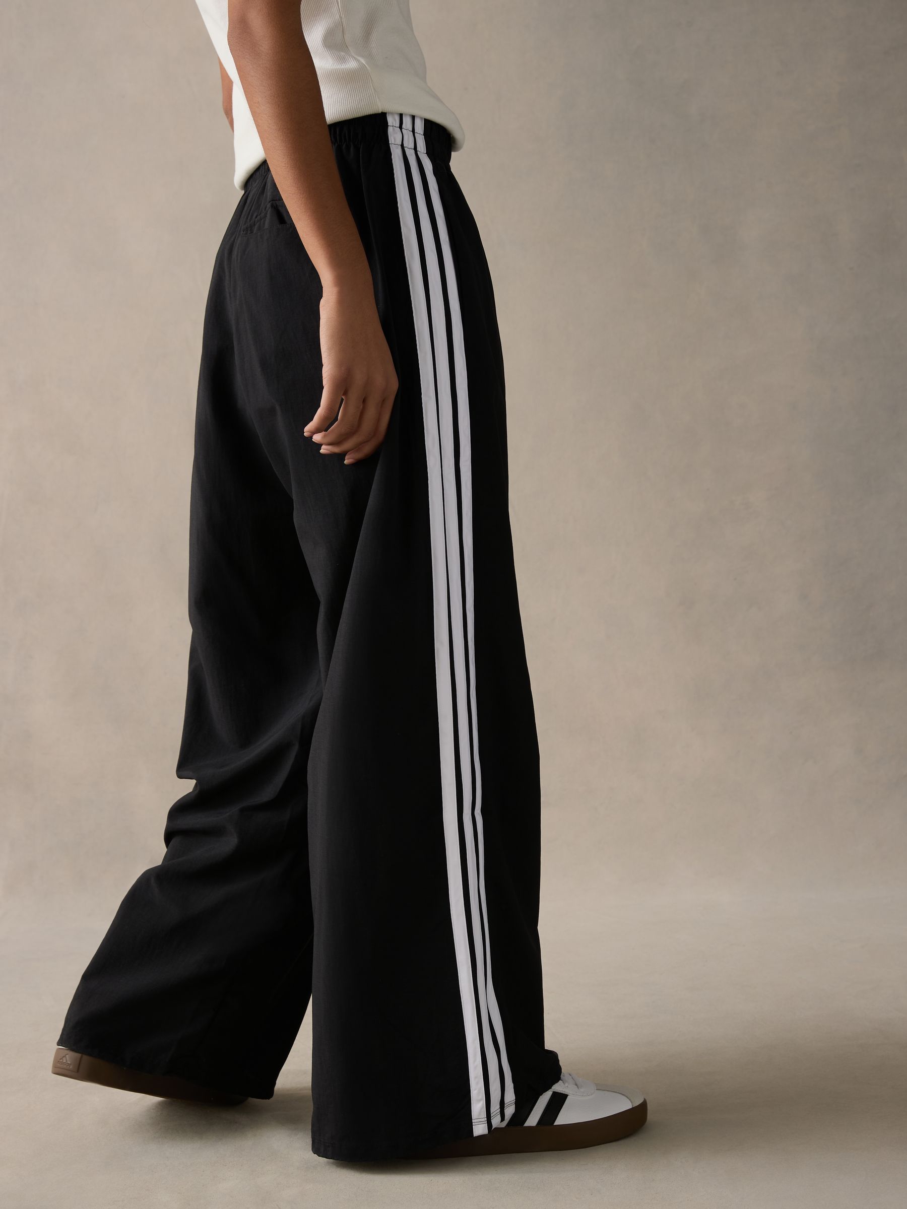 Buy adidas Black 3 Stripe Woven Wide Leg Joggers from Next USA