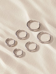 Silver Tone Stainless Steel Graduated Huggie Hoop Earrings 3 Pack - Image 4 of 6