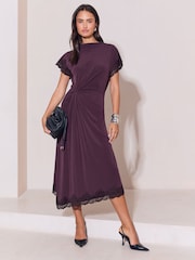 Lipsy Burgundy Red Knot Side Drape Lace Asymmetric Midi Dress - Image 1 of 6