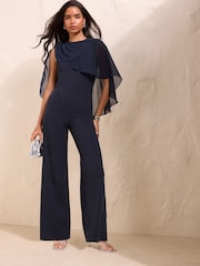 Friends Like These Navy Blue Petite Asymmetric Cape Sleeve Jumpsuit - Image 1 of 5