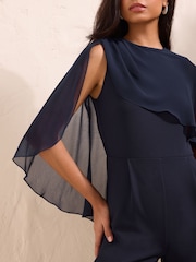 Friends Like These Navy Blue Petite Asymmetric Cape Sleeve Jumpsuit - Image 4 of 5