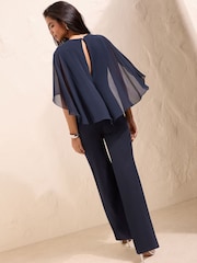 Friends Like These Navy Blue Petite Asymmetric Cape Sleeve Jumpsuit - Image 5 of 5