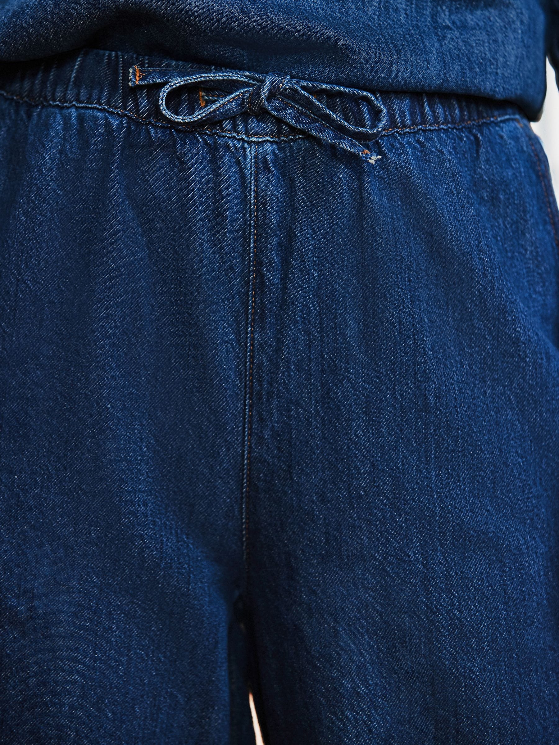 Buy Mid Blue Elasticated Waist Wide Leg Jeans from Next USA Buy Mid Blue Elasticated Waist Wide Leg Jeans from Next USA
