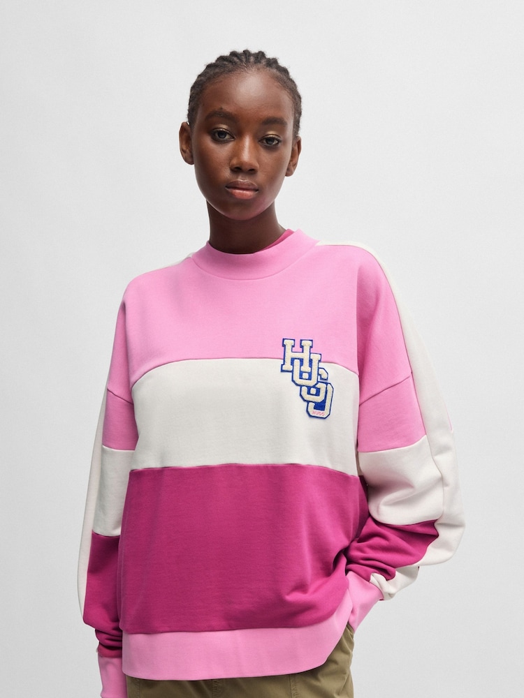 HUGO Blue Pink Oversized Fit Terry 100% Cotton Sweatshirt With Varsity Logo - Image 1 of 5 HUGO Blue Pink Oversized Fit Terry 100% Cotton Sweatshirt With Varsity Logo - Image 1 of 5