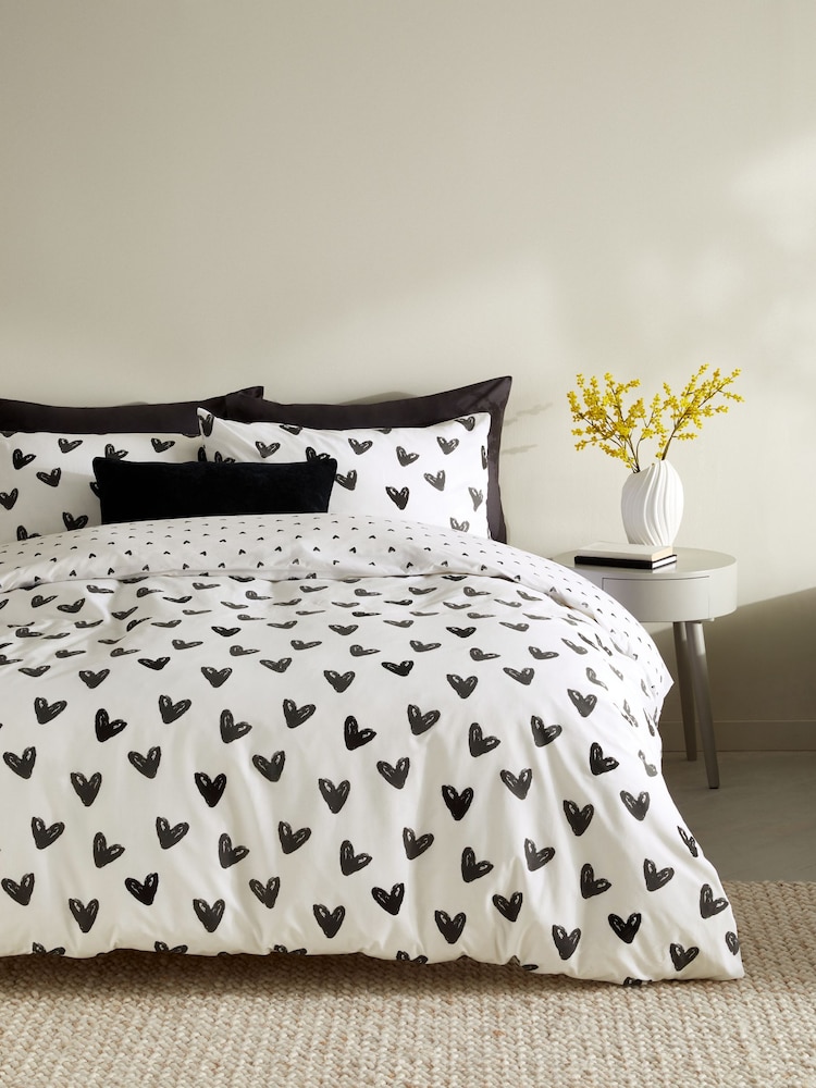 Black/White Heart Reversible Duvet Cover and Pillowcase Set - Image 1 of 4