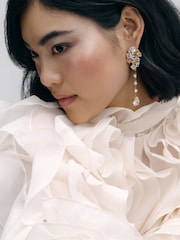 CERENE Vire Clear Crystal Gold Tone Cluster Statement Drop Earrings - Image 1 of 6
