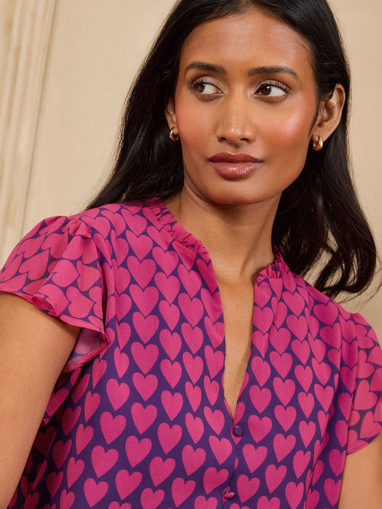 Love & Roses Navy Heart Flutter Sleeve Blouse - Image 2 of 5 Love & Roses Navy Heart Flutter Sleeve Blouse - Image 2 of 5