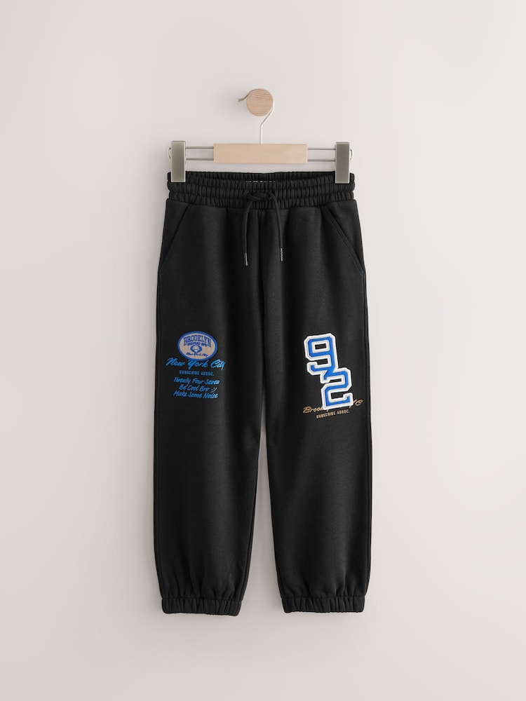 Black Varsity Graphic Joggers (3-16yrs) - Image 1 of 3
