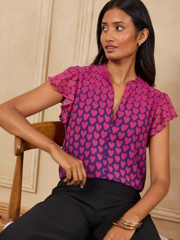 Love & Roses Navy Petite Heart Flutter Sleeve Blouse - Image 1 of 5 Love & Roses Navy Petite Heart Flutter Sleeve Blouse - Image 1 of 5