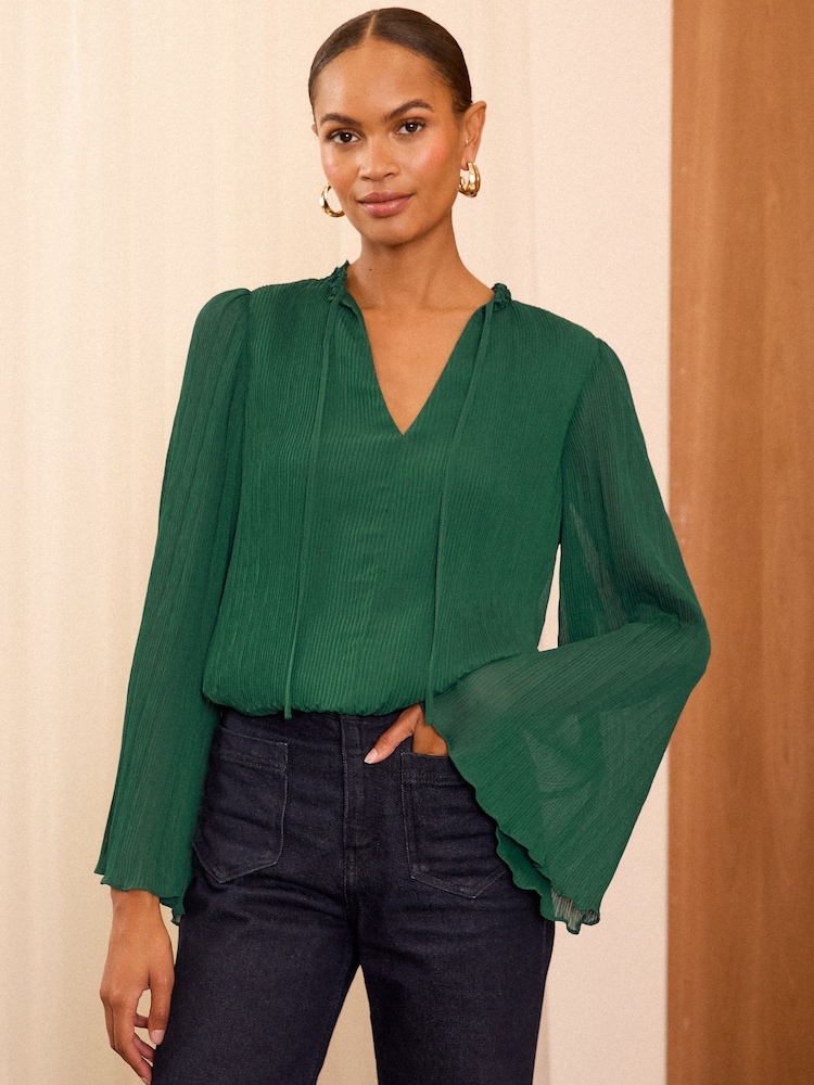 Love & Roses Green Pleated V Neck Flute Sleeve Blouse - Image 1 of 4