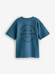 Rostbraun/Schwarz/Blau/Grau - Kurzarm-T-Shirts in Relaxed-Fit mit Grafikprint im 4er-Pack (3–16 J.) - Bild 4 von 9