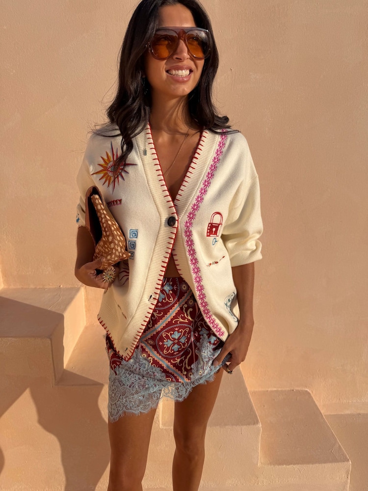 Never Fully Dressed Cream Embroidered Martha Cardigan in Dolce Vita Print - Image 1 of 3 Never Fully Dressed Cream Embroidered Martha Cardigan in Dolce Vita Print - Image 1 of 3
