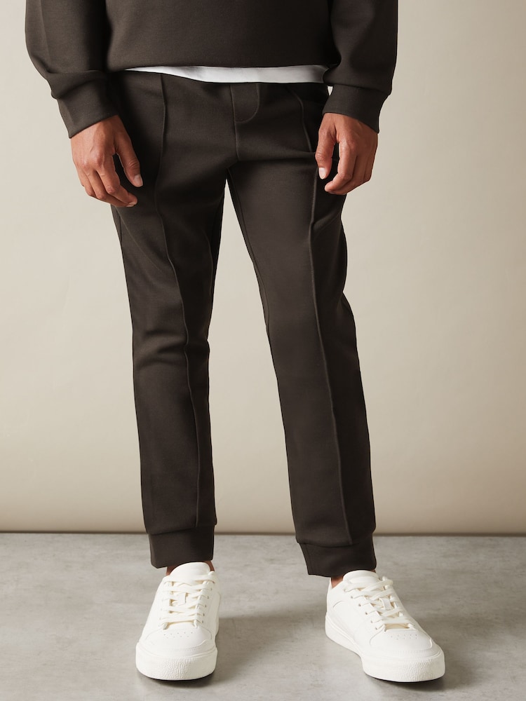 Marrón chocolate - Pantalones de chándal con cordón ajustable de punto entrelazado Premier de Reiss - Imagen 1 de 4