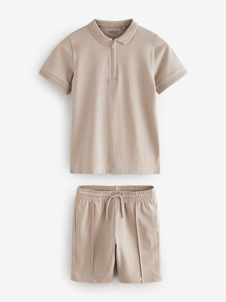 Piedra - Conjunto de pantalones cortos y polo con cuello con cremallera (3-16años) - Imagen 1 de 5 Piedra - Conjunto de pantalones cortos y polo con cuello con cremallera (3-16años) - Imagen 1 de 5