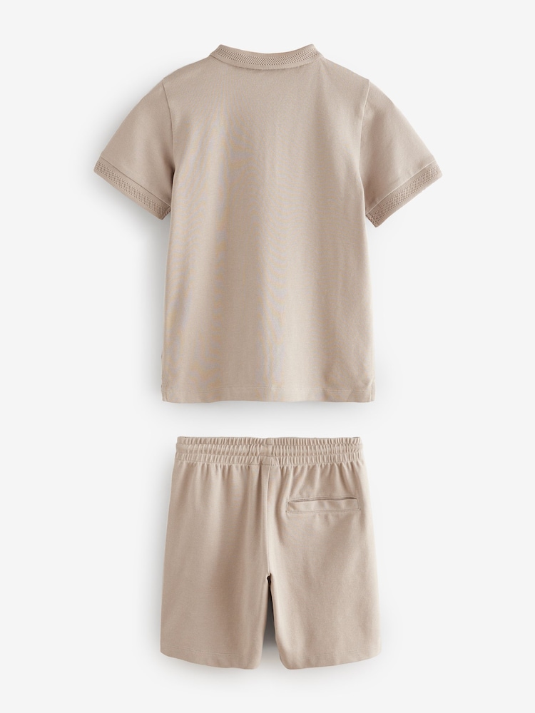 Piedra - Conjunto de pantalones cortos y polo con cuello con cremallera (3-16años) - Imagen 2 de 5 Piedra - Conjunto de pantalones cortos y polo con cuello con cremallera (3-16años) - Imagen 2 de 5