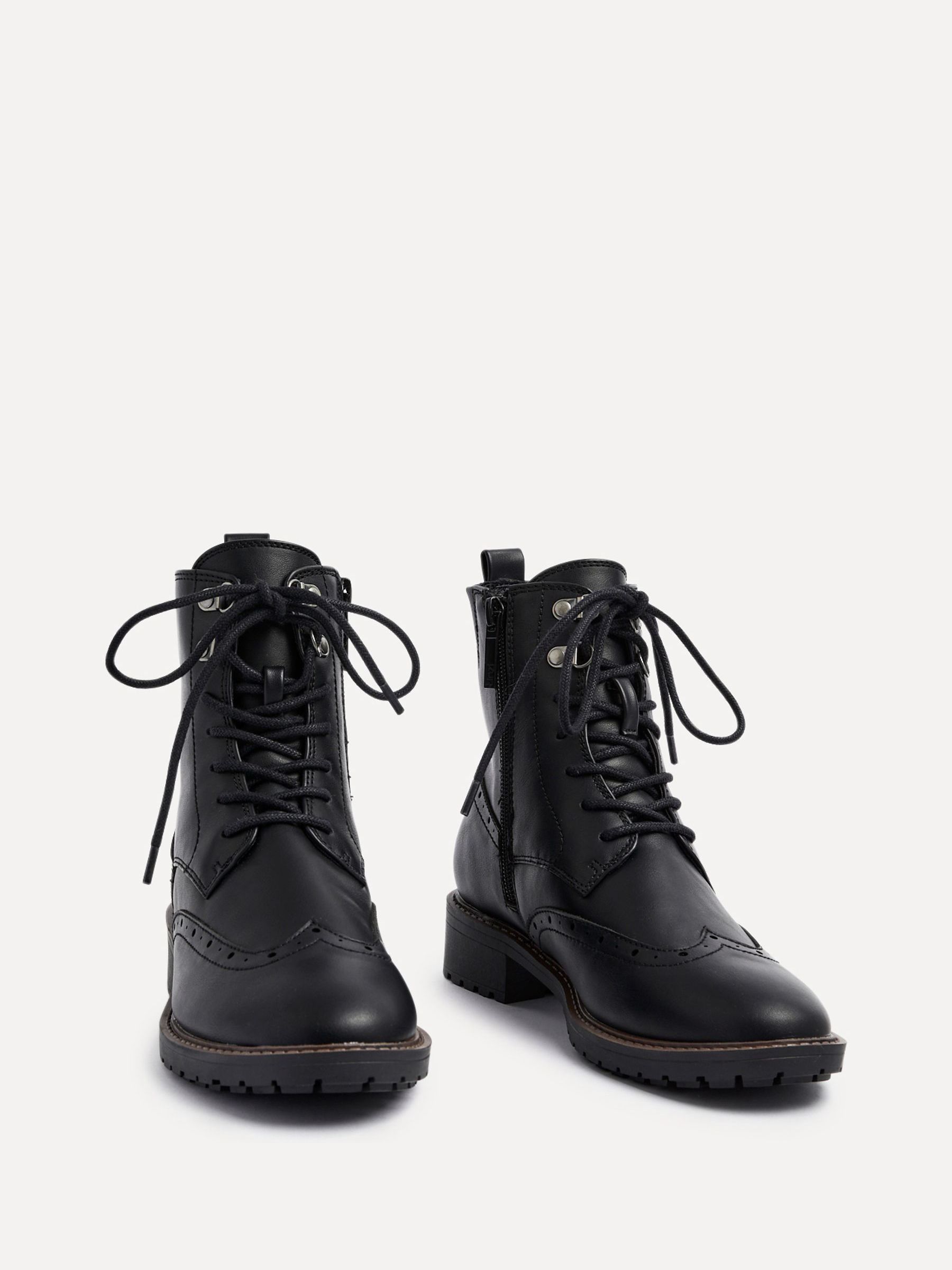 Buy Linzi Black Ashleigh Lace Up Biker Ankle Boots from Next South