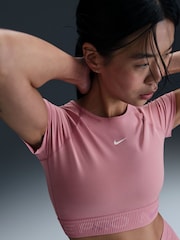 Nike Elemental Pink Pro Dri-FIT Cropped Graphic Short Sleeve Top - Image 1 of 6