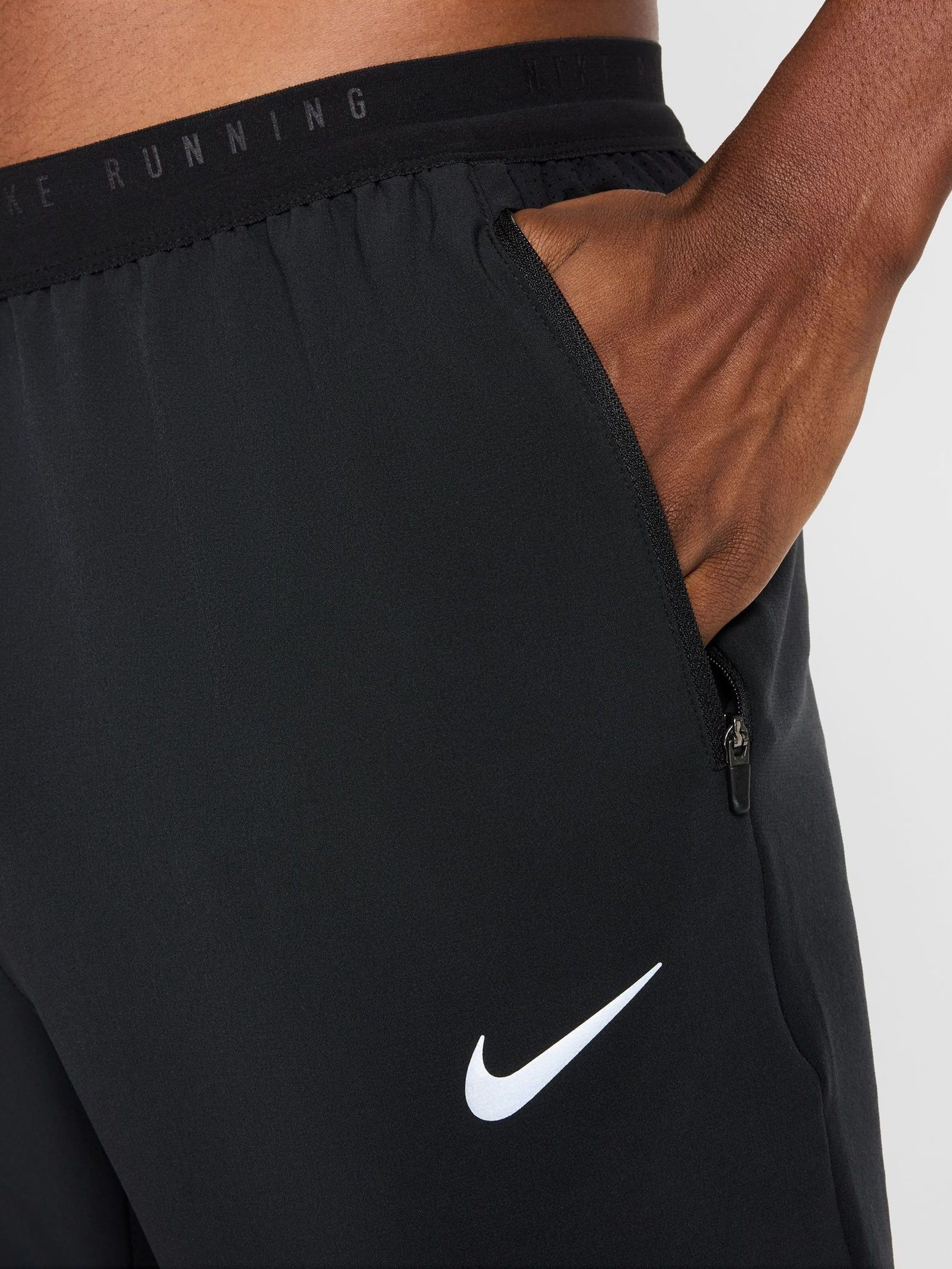 Buy Nike Black Dri-FIT Stride Woven Running Joggers from Next