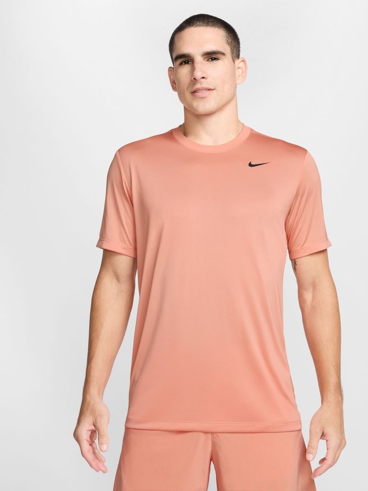 Абрикосово-оранжевый - Спортивная футболка Nike Dri-FIT Legend  - Изображение 1 из 4