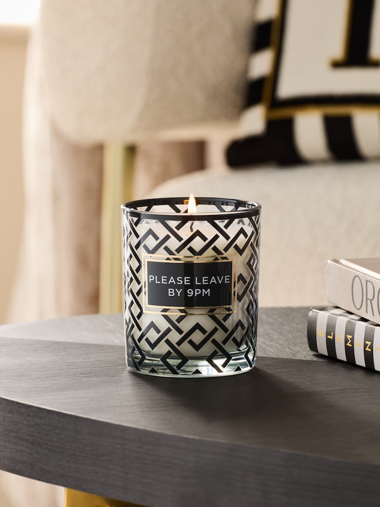 Black/White Please Leave By 9pm Slogan Midnight Amber and Patchouli Scented Candle - Image 1 of 3