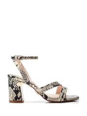 Moda in Pelle Animal Raeya Tubular Strappy Swoosh Heel Sandals - Image 1 of 4