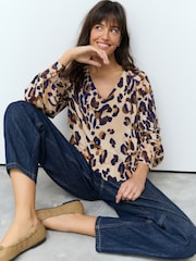 Estampado animal - Blusa de punto y manga larga con cuello en pico - Imagen 1 de 8