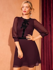 Love & Roses Burgundy Red Petite Velvet Bow Detail Skater Dress - Image 1 of 4
