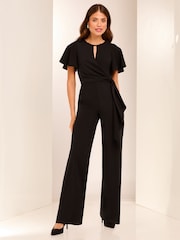 Lipsy Black Flutter Sleeve Tie Side Wide Leg Jumpsuit - Image 1 of 4