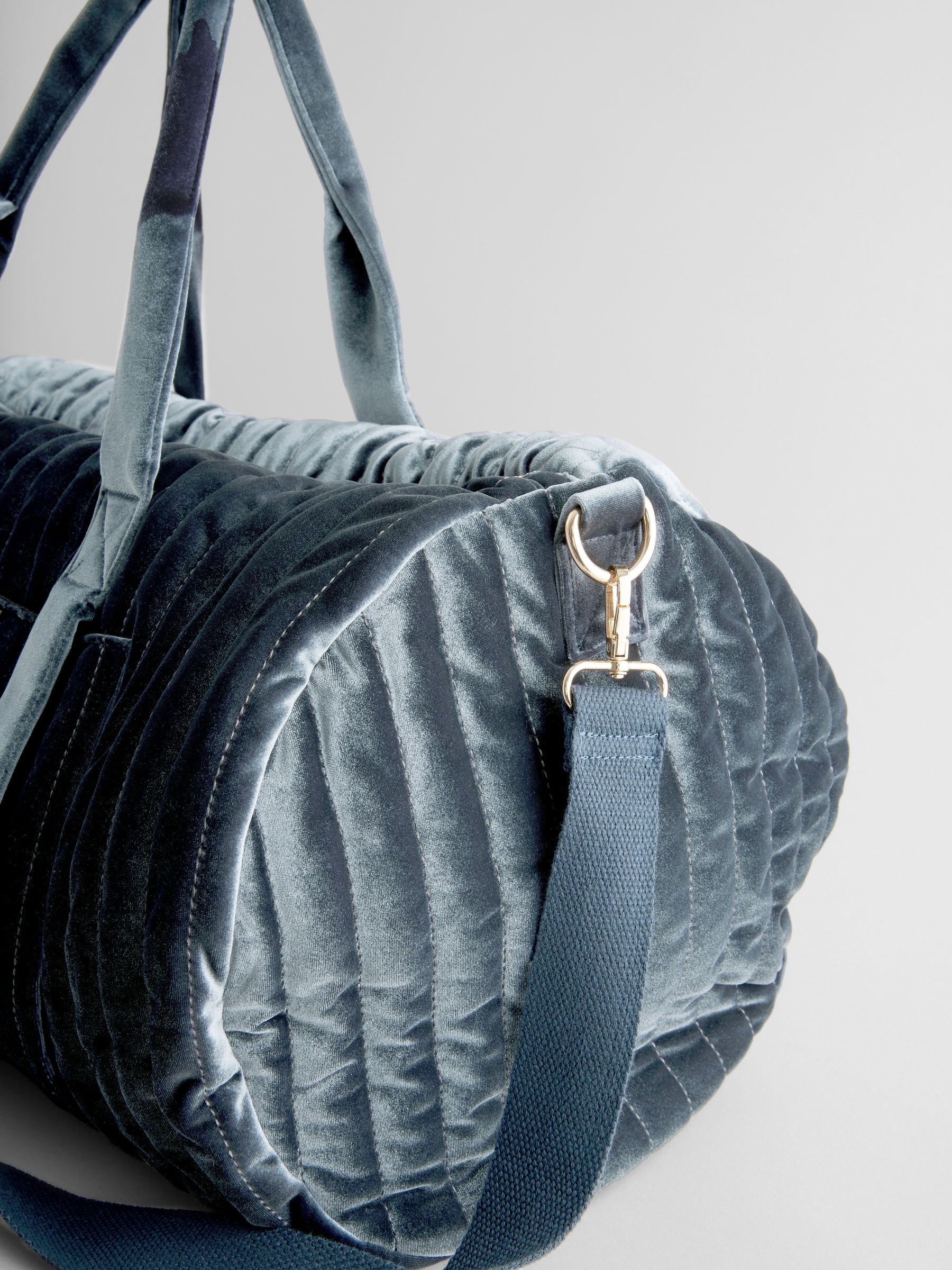 Buy Blue Velvet Quilted Weekender Bag from Next Germany