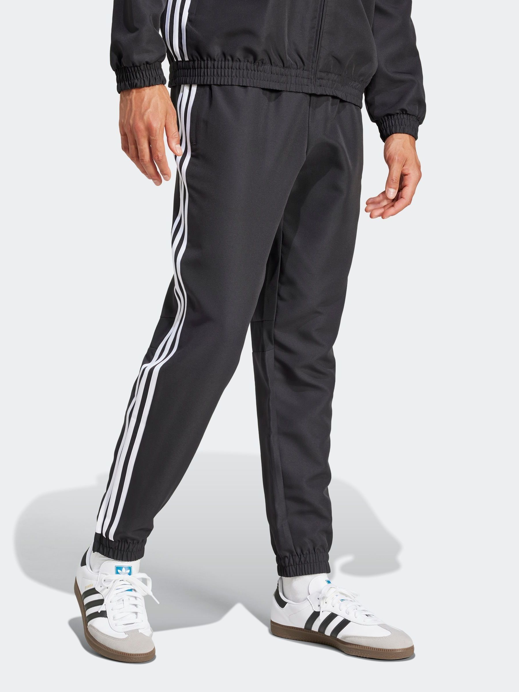 Buy adidas Black Tiro 25 Essentials Woven Tracksuit Joggers from