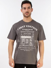 Brands In Black Bookstore Main Character Energy Graphic T-Shirt - Image 1 of 4