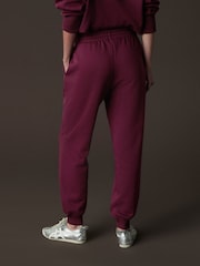 Burgundy Red Relaxed Fit Cuffed Wellness Slogan Graphic Track Joggers - Image 4 of 7