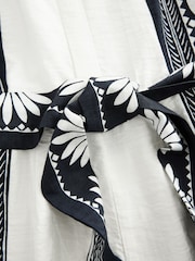 White/Black Placement Floral Short Sleeve Tie Waist Placket Detail Jumpsuit - Image 7 of 8