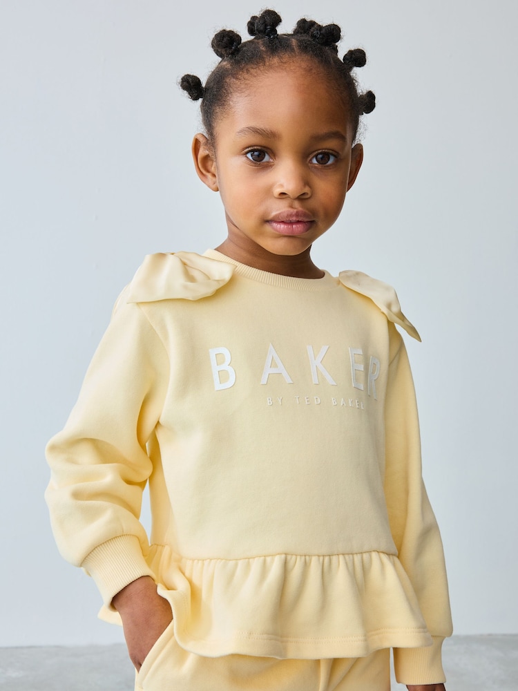 Buttermilch - Baker by Ted Baker Satin Bow Sleeve Sweater and Joggers Set 2 Piece - Bild 1 von 12 Buttermilch - Baker by Ted Baker Satin Bow Sleeve Sweater and Joggers Set 2 Piece - Bild 1 von 12