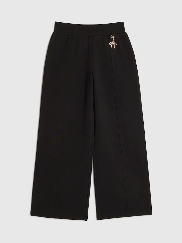 River Island platās bikses skolas sākumposmā - Attēls 1 no 4