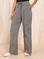Friends Like These Black Wide Leg Crinkle Jersey Printed Elasticated Waist Trousers - Image 1 of 4