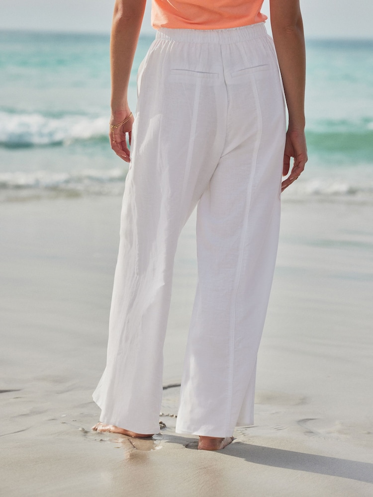 Buy White Wide Leg Pull-On Linen Blend Trousers from the Next UK - Main Image