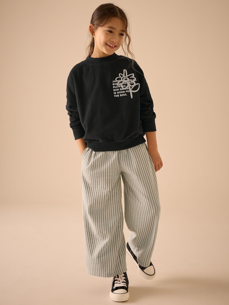 Black/White Graphic Sweatshirt And Stripe Textured Trousers Set (3-16yrs) - Image 1 of 7