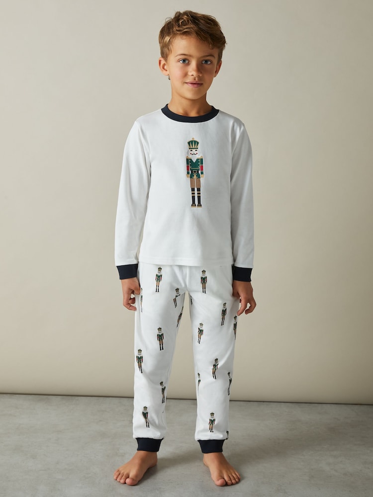 Reiss White Hornton Set 3-9 yrs Brushed-Cotton Nutcracker-Print Pyjama Set - Image 1 of 4 Reiss White Hornton Set 3-9 yrs Brushed-Cotton Nutcracker-Print Pyjama Set - Image 1 of 4