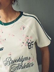 Ecru Graphic Brooklyn Embroidered Floral Football Jersey Inspired Crew Neck Short Sleeve Cotton Graphic T-Shirt - Image 5 of 9