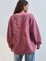 Blush Pink Floral Graphic Print Relaxed Fit Teddy Borg Fleece Cord Back Longline Crew Neck Sweatshirt - Image 1 of 8