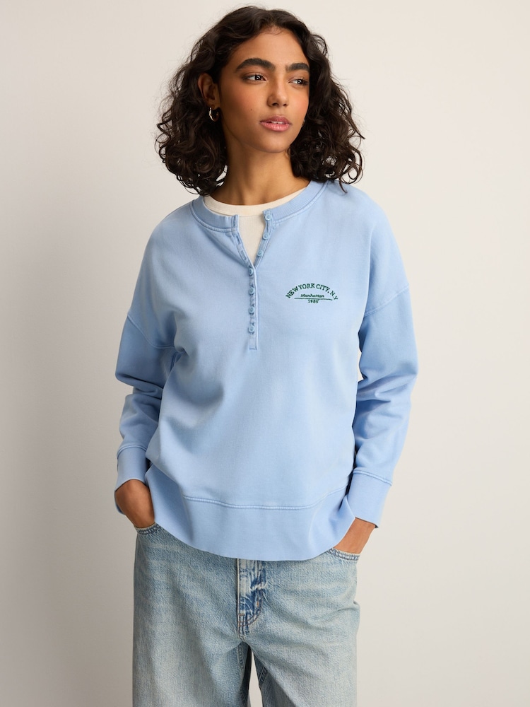أزرق فاتح - Washed Henley Button Collar Long Sleeve Graphic 100% Cotton Sweatshirt - صورة 1 من 9