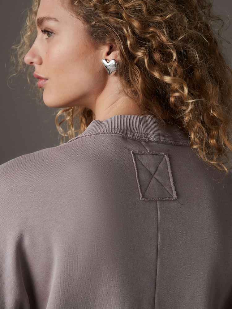 Malve/Violett - Sweatjacke in Relaxed-Fit mit Knopfleiste und Waschung - Bild 5 von 5 Malve/Violett - Sweatjacke in Relaxed-Fit mit Knopfleiste und Waschung - Bild 5 von 5