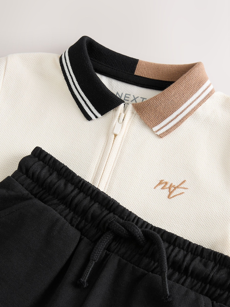 Hellbraun - Kurzärmliges Polo-Shirt mit Reißverschluss am Kragen und Shorts im Set (3M.–7J.) - Bild 9 von 9 Hellbraun - Kurzärmliges Polo-Shirt mit Reißverschluss am Kragen und Shorts im Set (3M.–7J.) - Bild 9 von 9