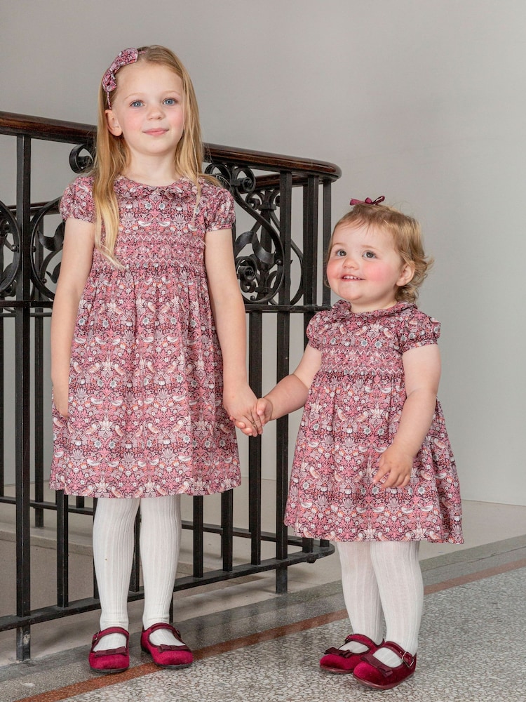 Trotters London Little Red Liberty Print Plum Strawberry Thief Smocked 100% Cotton Dress - Image 1 of 5 Trotters London Little Red Liberty Print Plum Strawberry Thief Smocked 100% Cotton Dress - Image 1 of 5