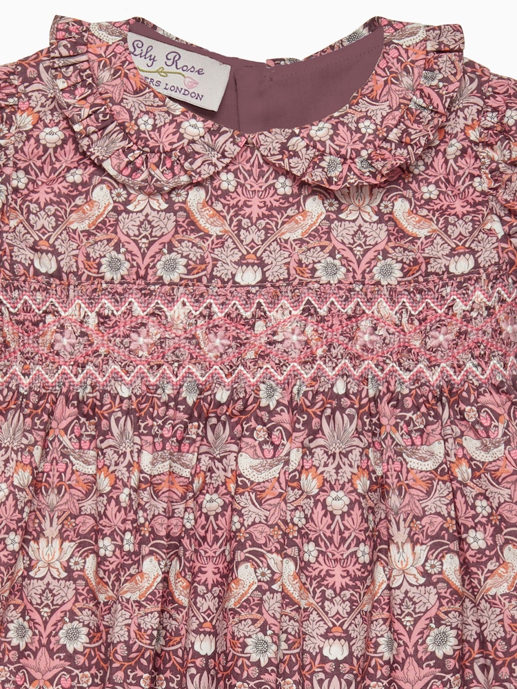 Trotters London Little Red Liberty Print Plum Strawberry Thief Smocked 100% Cotton Dress - Image 5 of 5 Trotters London Little Red Liberty Print Plum Strawberry Thief Smocked 100% Cotton Dress - Image 5 of 5