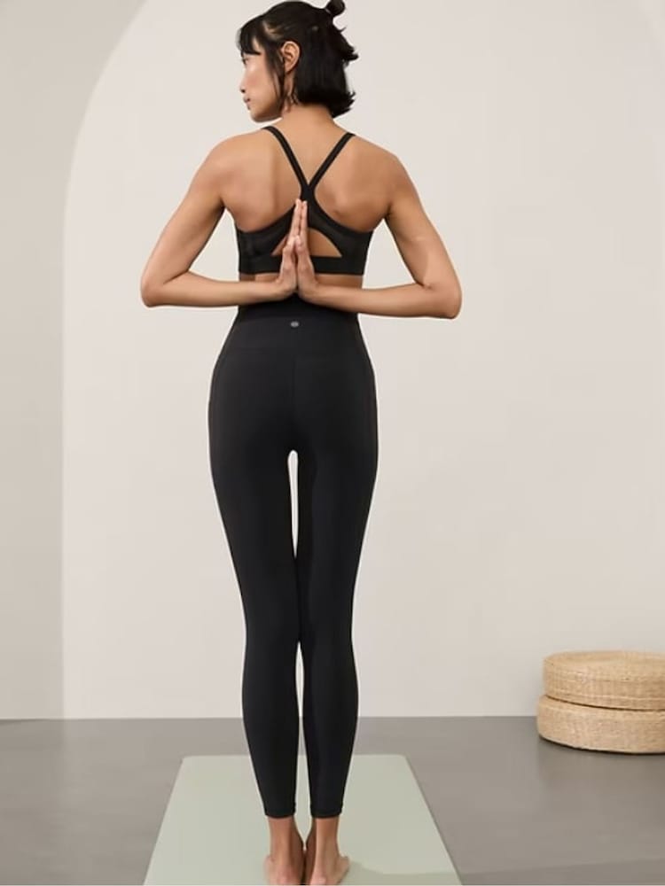 Athleta Black Saluation High Waisted Crossover Pocket Leggings - Image 2 of 3 Athleta Black Saluation High Waisted Crossover Pocket Leggings - Image 2 of 3