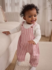 Rosa gestreift - Baby-Set aus Langarmbody und Latzhose (0 Monate bis 2 Jahre) - Bild 1 von 3
