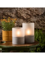 Lights4fun Set of 2 Clear Solar TruGlow Frosted Glass Outdoor LED Candles - Image 1 of 2