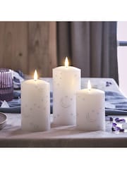 Lights4fun White Truglow LED Pillar Candles with Moon Star Design Set of 3 - Image 2 of 2